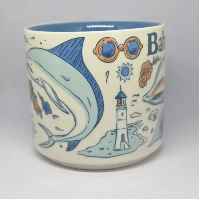 Starbucks Been There Series Bahamas mug with Bahamas in teal lettering, a conch shell, a wave and sailboats — side view