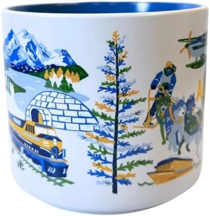 Starbucks Discovery Series Alaska mug with sled dogs, a floatplane, an eagle and blue flowers around the word ALASKA — side view