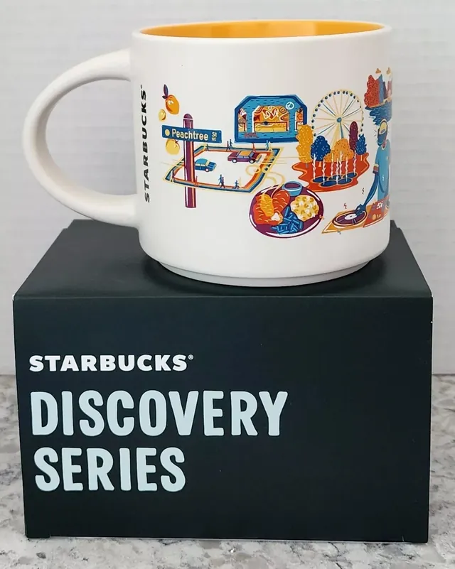 Starbucks Discovery Series Atlanta mug with a phoenix, a skyline, a stadium and a race car around the word ATLANTA — back view