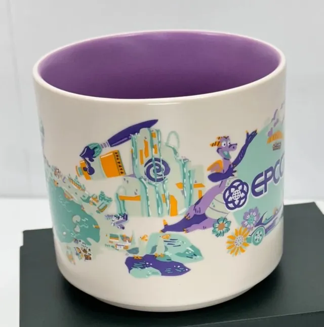 Starbucks Discovery Series Epcot mug with a purple dragon, fireworks, a sphere and a futuristic car around the word EPCOT — side view