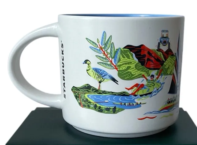 Starbucks Discovery Series Kauai mug with red KAUAI lettering, a green rooster with two chicks, a mountain and a red car — back view