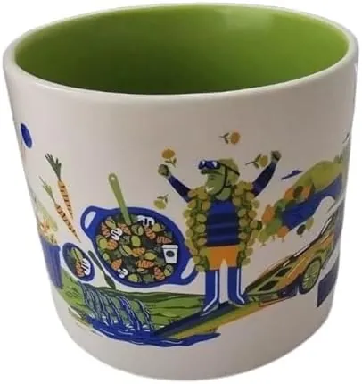 Starbucks Discovery Series Kentucky mug with two wide-brimmed hats, a banjo, a mint drink and a large bird around the word KENTUCKY — side view