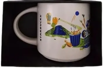 Starbucks Discovery Series Kentucky mug with two wide-brimmed hats, a banjo, a mint drink and a large bird around the word KENTUCKY — back view