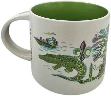 Starbucks Discovery Series Louisiana mug with a crawfish, a pink and yellow flower, a steamboat and a canoe around the word LOUISIANA — back view