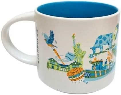 Starbucks Discovery Series New York mug with blue roses, a cake slice, a fish and a chair around the words NEW YORK — back view
