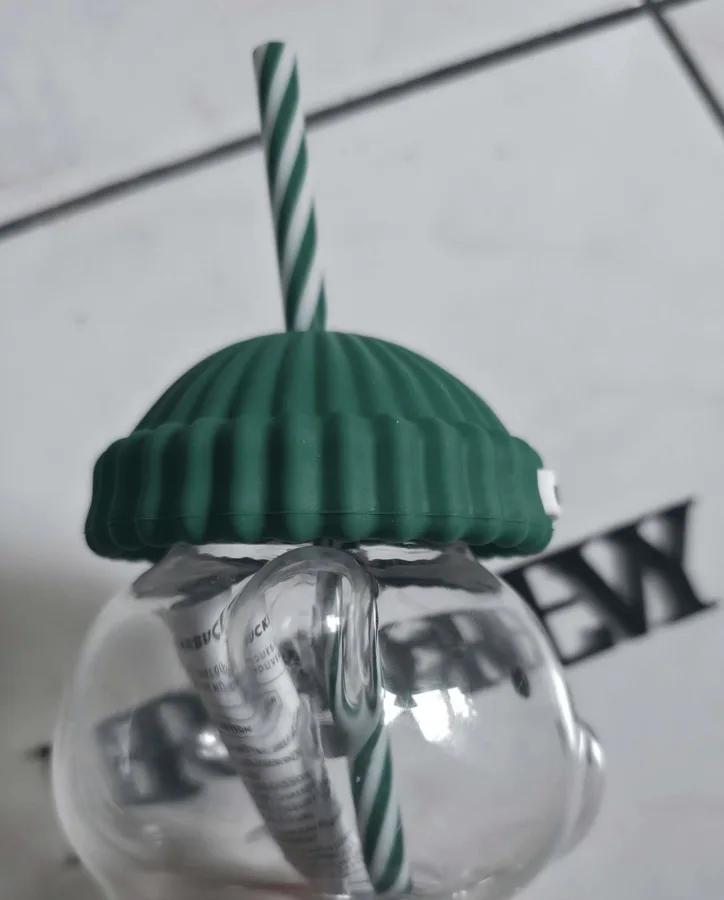 Side view from the forehead up to the lid, showing how low the hat sits.
