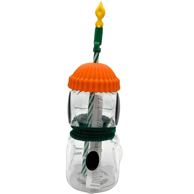 Starbucks Peanuts Snoopy glass cold cup with orange beanie lid, green scarf and Woodstock straw topper, back view