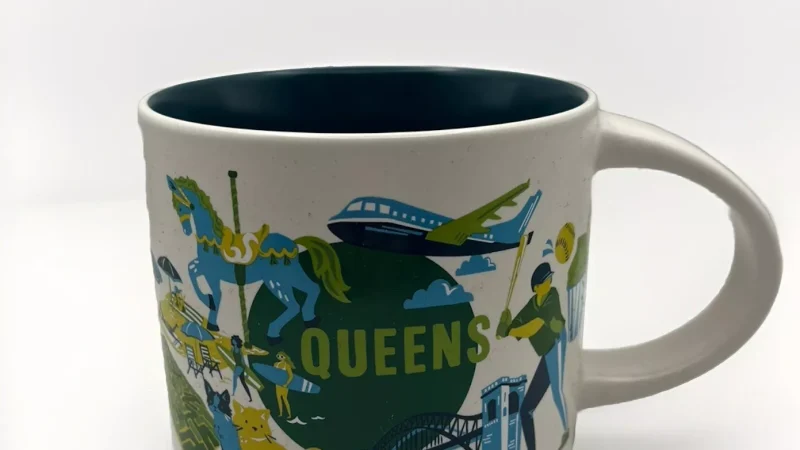 Queens Starbucks mug displaying a carousel horse, baseball player, street food scene, and birds.