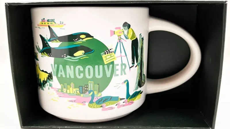 Vancouver Starbucks mug with images of kayaking, mountains, whale, and wildlife.