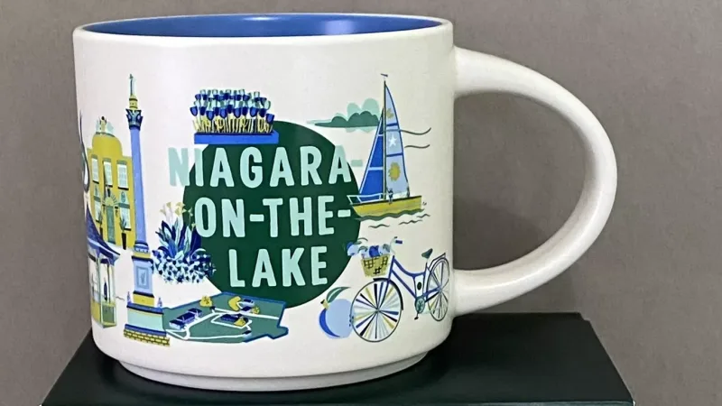 Niagara-on-the-Lake mug handle with the Starbucks logo.