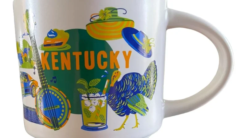 Kentucky Starbucks mug with images of a mint julep, Derby hat, banjo, turkey, and a race car.