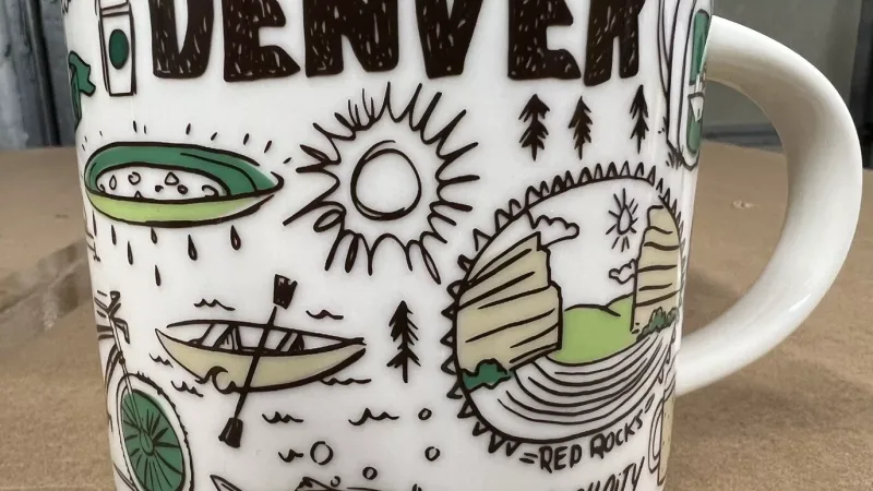 Denver Starbucks Been There Series mug featuring Rocky Mountains, Red Rocks Amphitheatre, and South Platte River.