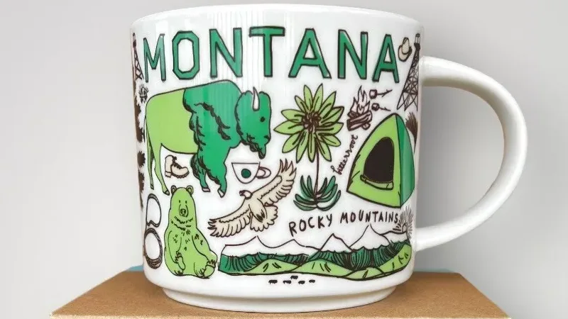 Front view of Starbucks Been There Series Montana mug with bison and Glacier National Park illustrations.